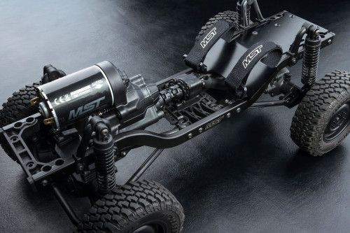 Трофи модель CFX от MST (Max Speed Technology) 1/10 4WD набор для сборки с кузовом M-BENZ Unimog 406, регулятором и мотором фото 5