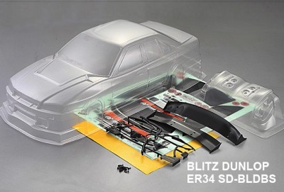 Кузов Nissan GTR (R34) Blitz Dunlop не окрашенный с отражателями, наклейками и спойлером